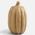 A decorative carved pumpkin sculpture in a light natural wood finish, shown against a plain light gray background.