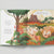 Open book with colorful illustrations of dinosaurs and a volcano on a white background