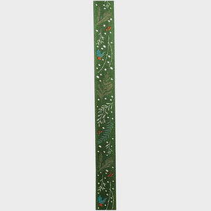 Decorative green ribbon with floral patterns on a white background