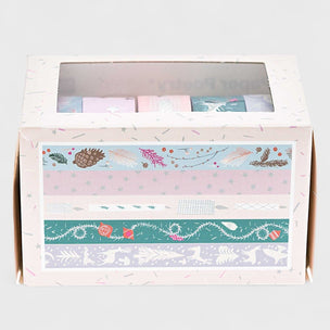 Set of washi tape rolls in a decorative box on a white background