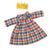 colourful plaid dress for doll win white background
