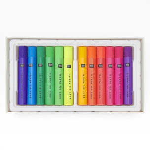 Set of colorful oil pastels in a box on a white background