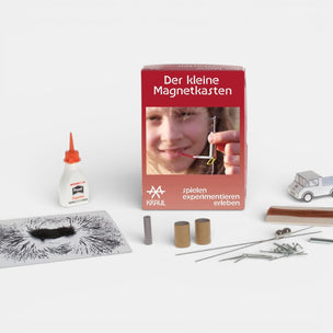 Magnet science kit with 'Der kleine Magnetkasten' box on a white background