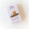 Elsa Beskow Mystery Box packaging with illustration of children in a boat on a white background