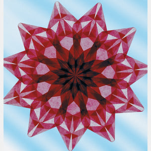 Geometric star-shaped design with red and pink patterns on a blue background