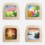 Four square wooden picture frames arranged in a 2x2 grid on a white background, each containing a different colorful landscape painting: a pink tree with sheep, flowers and a bee, a forest with deer, and a snowy winter scene.