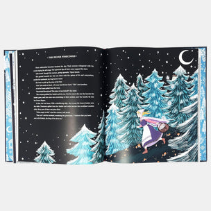 Open book with a winter scene illustration and text on a white background
