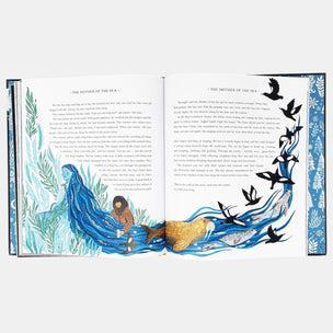 Open book with illustrated pages featuring ocean scenes and text.