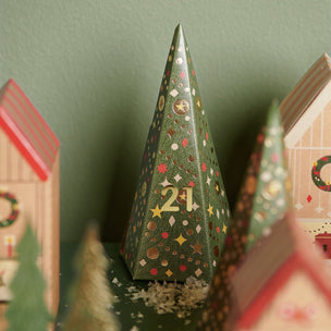 Decorative Christmas tree with number '21' on a green background