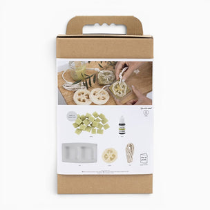 Product packaging with images of items included, on a white background
