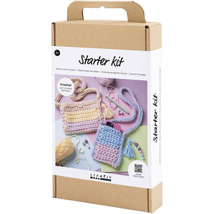 Crochet starter kit packaging with a handle on a white background