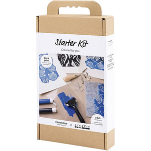Cardboard box packaging of a 'Starter Kit' with block printing tools and materials on a white background.
