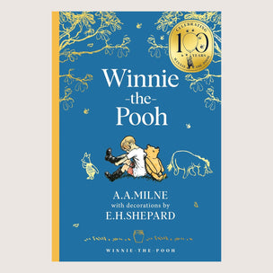 Winnie-the-Pooh book cover with blue background and yellow accents