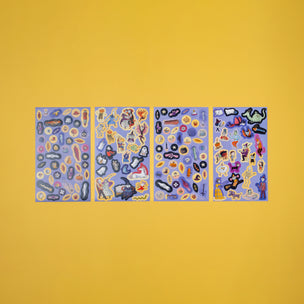 Four blue sheets of stickers with various designs on a yellow background