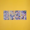 Four blue sheets of stickers with various designs on a yellow background
