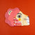 Pack of animal-shaped stickers with a lion design on an orange background