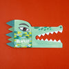 Londji Paper mask crocodile design on an orange background