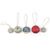 Set of five small round decorative items with strings on a white background