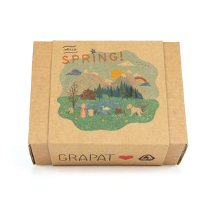 Grapat cardboard box with spring-themed illustration on a white background