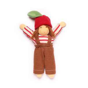 Toy figure wearing a red hat, striped shirt, and brown overalls on a white background