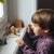 boy by window with grapat characters 