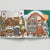 Magic Cat Illustrated Christmas scene with houses and snow, featuring a snowy village setting.