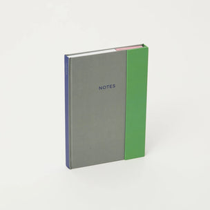 Notebook with green and gray design on a white background