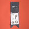 Londji Black sleeve with tattoo designs on a red background