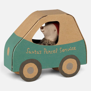 A small Maileg mouse toy sitting inside a cardboard car-shaped box labeled 'Santa's Parcel Service' in teal and tan, on a light gray background.