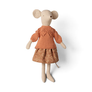 A plush Maileg mouse doll with beige fabric body and ears, wearing a knitted rust-orange sweater and a patterned brown skirt, standing against a plain white background.