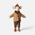 A plush Maileg mouse doll dressed in autumn clothing, featuring a brown tweed jacket, striped brown pants, a plaid scarf, and an acorn hat, set against a plain light gray background.