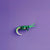 Green paper crocodile on a purple background