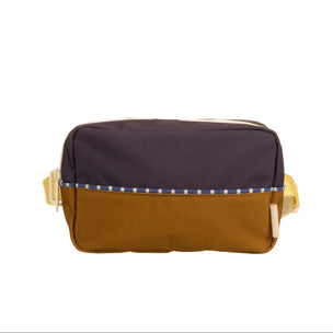 Two-toned bag with a dark top and brown bottom on a white background