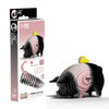 Black and pink pig-shaped puzzle with a yellow duck on its back, next to its packaging.
