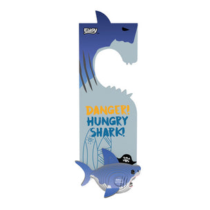 A novelty shark-shaped door hanger with a blue and gray shark silhouette, the text 'DANGER! HUNGRY SHARK!' in orange and blue, and a small shark figure at the bottom wearing a black pirate hat, shown on a white background.