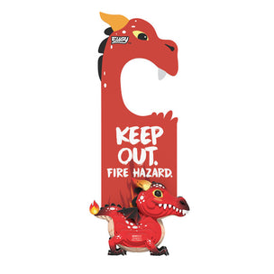 A red fire alarm door hanger with cartoon dragon illustrations and the text 'KEEP OUT. FIRE HAZARD.