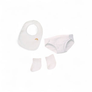 Baby bib, shorts, and socks set on a white background