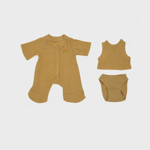 Baby clothing set with romper, tank top, and diaper on a light gray background
