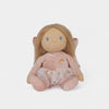 Plush toy fairy with blonde hair and blue eyes on a light gray background