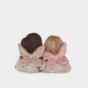 Two dolls with butterfly wings on a white background