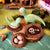 felt dino on wooden disk 