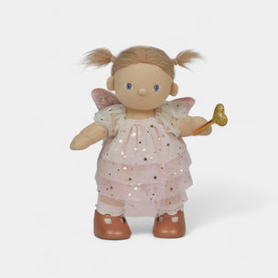 Toy fairy doll with a star-patterned dress on a white background