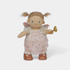 Toy fairy doll with a star-patterned dress on a white background