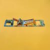 Londji Toy set with various pieces on a yellow background