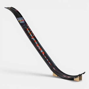 Model of a race track with a curved section on a white background