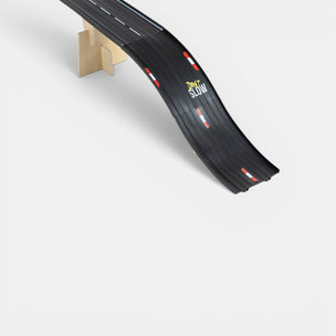 Black toy car track with a curved section on a white background