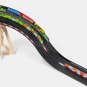 Toy race track with branding on a white background
