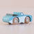 Toy truck with wooden wheels on a light background