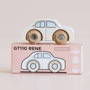 Toy car with wooden wheels on a pink box featuring 'GT110 RENE' branding.