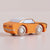 Orange toy car with wooden wheels on a beige background